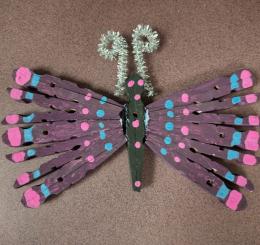 purple butterfly made from clothespins
