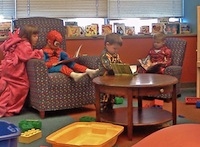 Who wouldn't want to read to these little partners? Halloween kids at Central Library