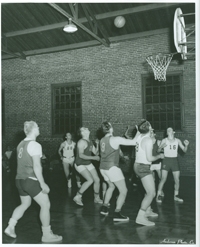 A basketball game at Italian Mission. Basketball