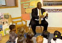 Mayor Sly James reads to children at the Berkley Early Childhood Center. Mayor Sly James