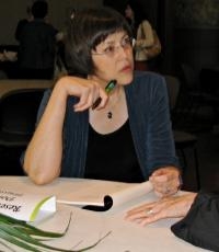 Donna Trussell prepares to sign her book at the Thorpe Menn Award at the Kansas City Library. Donna Trussell prepares to sign her book at the Thorpe Menn Award at the Kansas City Library.