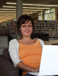 Gina Kaufmann will work for library card.