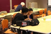 Adult literacy tutor Juli Whitney works with a student.