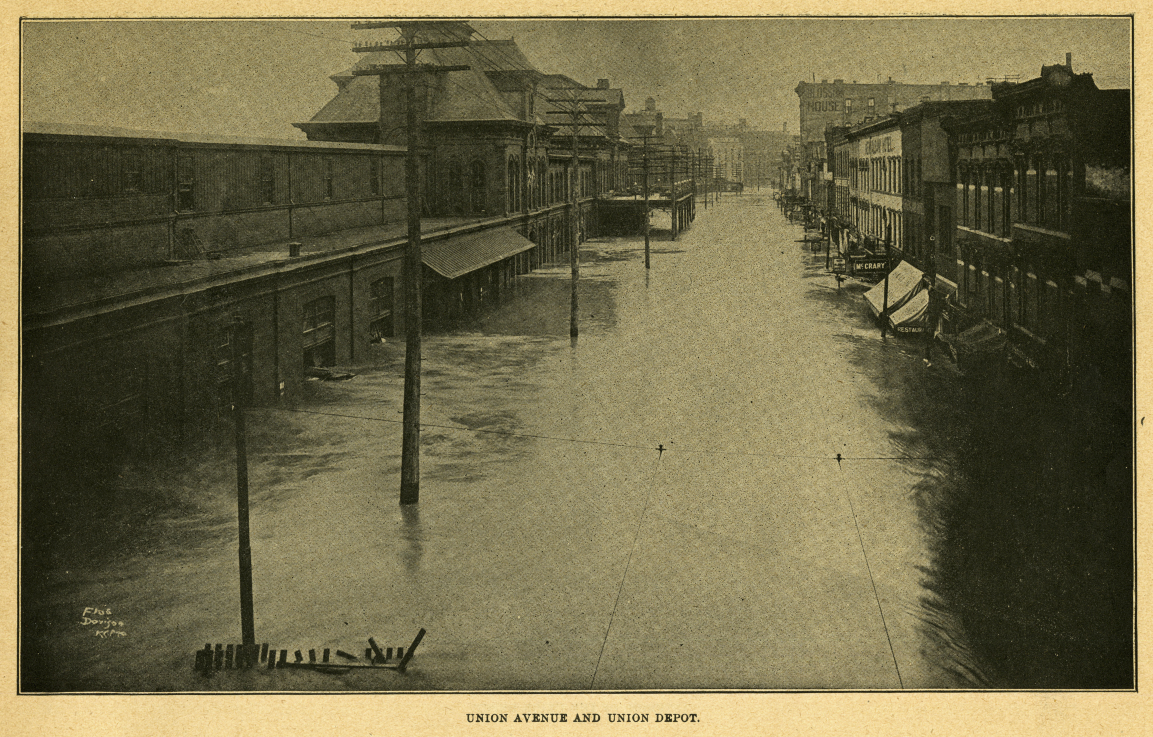 Union Avenue, its businesses, and the depot are overwhelmed by the 1903 Flood.