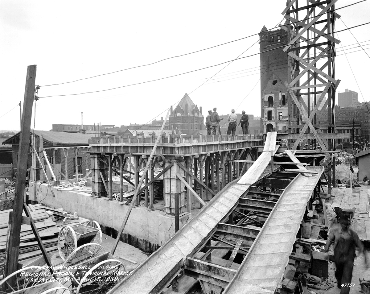 Construction of the new City Market with the tower from the old City Hall still standing in the background, 1939