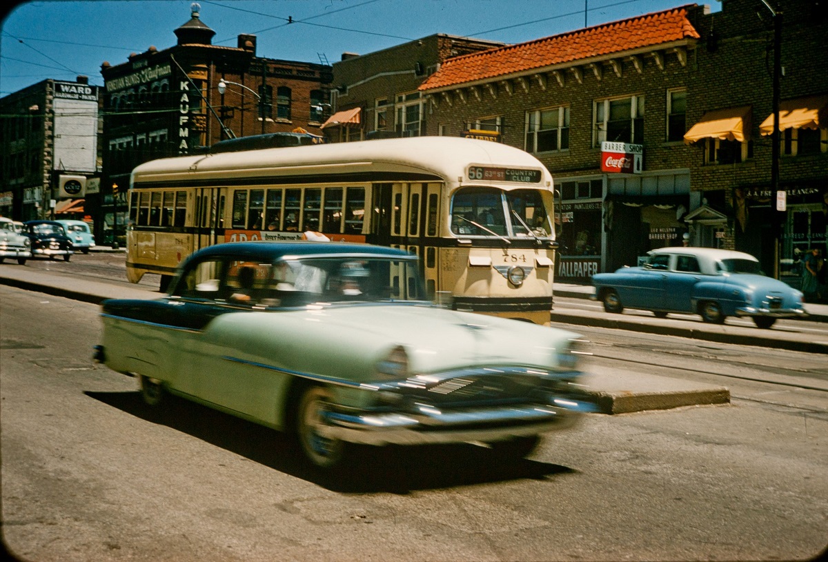 Color slide image of a streetcar on Main Street just south of 31st Street, dated June 19, 1957 – four days before service was discontinued. From the Dorothea Eldridge Slide Collection, Kansas City Public Library.