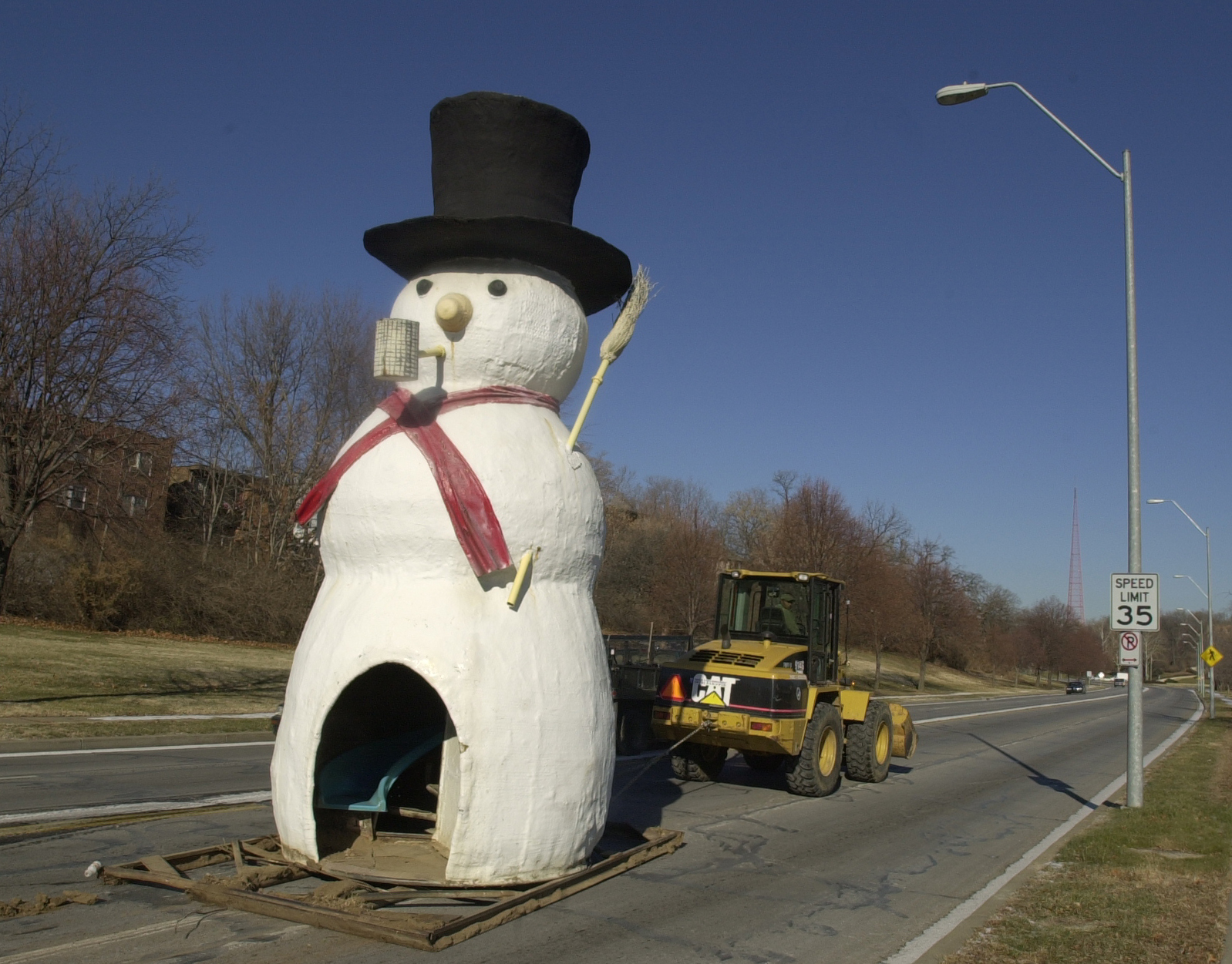 snowman being taken to his off-season home, 2002