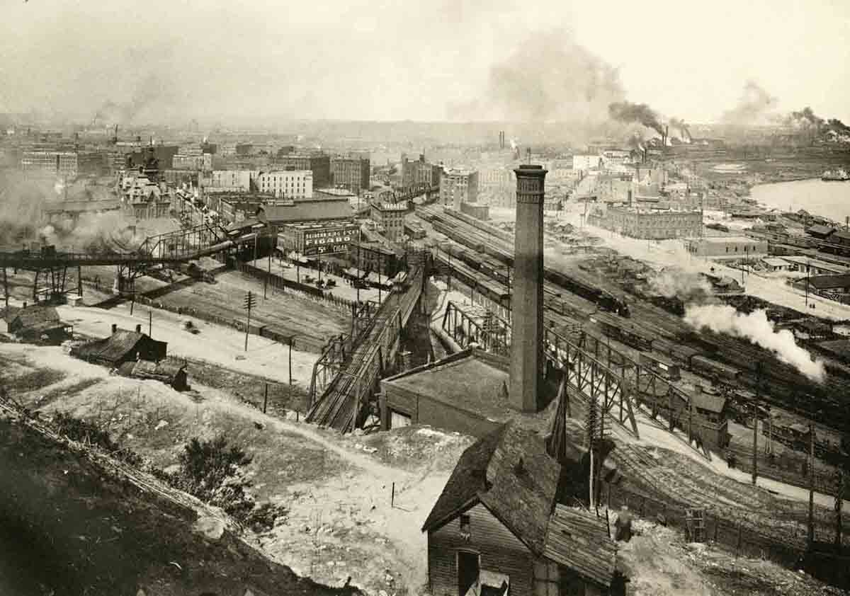 View looking down at the West Bottoms from Quality Hill showing the Ninth Street Incline and Eighth Street tunnel entering the bluffs, 1899