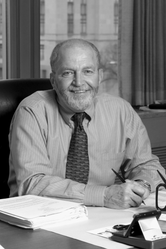 Smiling man at a desk