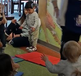 Children playing with bubbles in the library