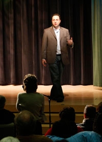 Aaron Deacon of the Social Media Club of KC addressed a crowd of 150 at the Give Us a Gig! kickoff event in Truman Forum. Give Us a Gig photo Aaron Deacon Social Media Club