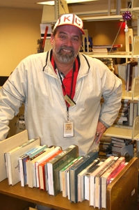 Kevin Craig keeps the stacks in order.