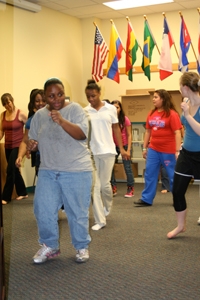 Keishla Collins (front left) and fellow Girls' Night Out members aren't afraid to dance after reading.