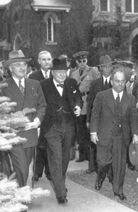Westminster College President Franc L. McCluer (far right) leads Truman and Churchill on a tour of campus. Westminster College President Franc L. McCluer (far right) leads Harry S. Truman (far left) and Winston Churchill (center) on a tour of campus.