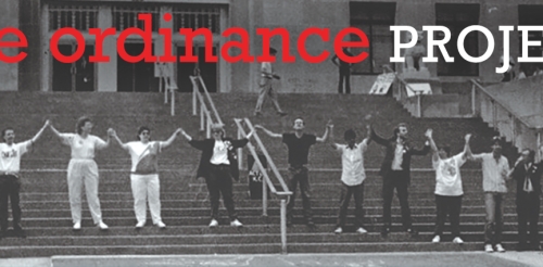 protest with people on stairs holding hands